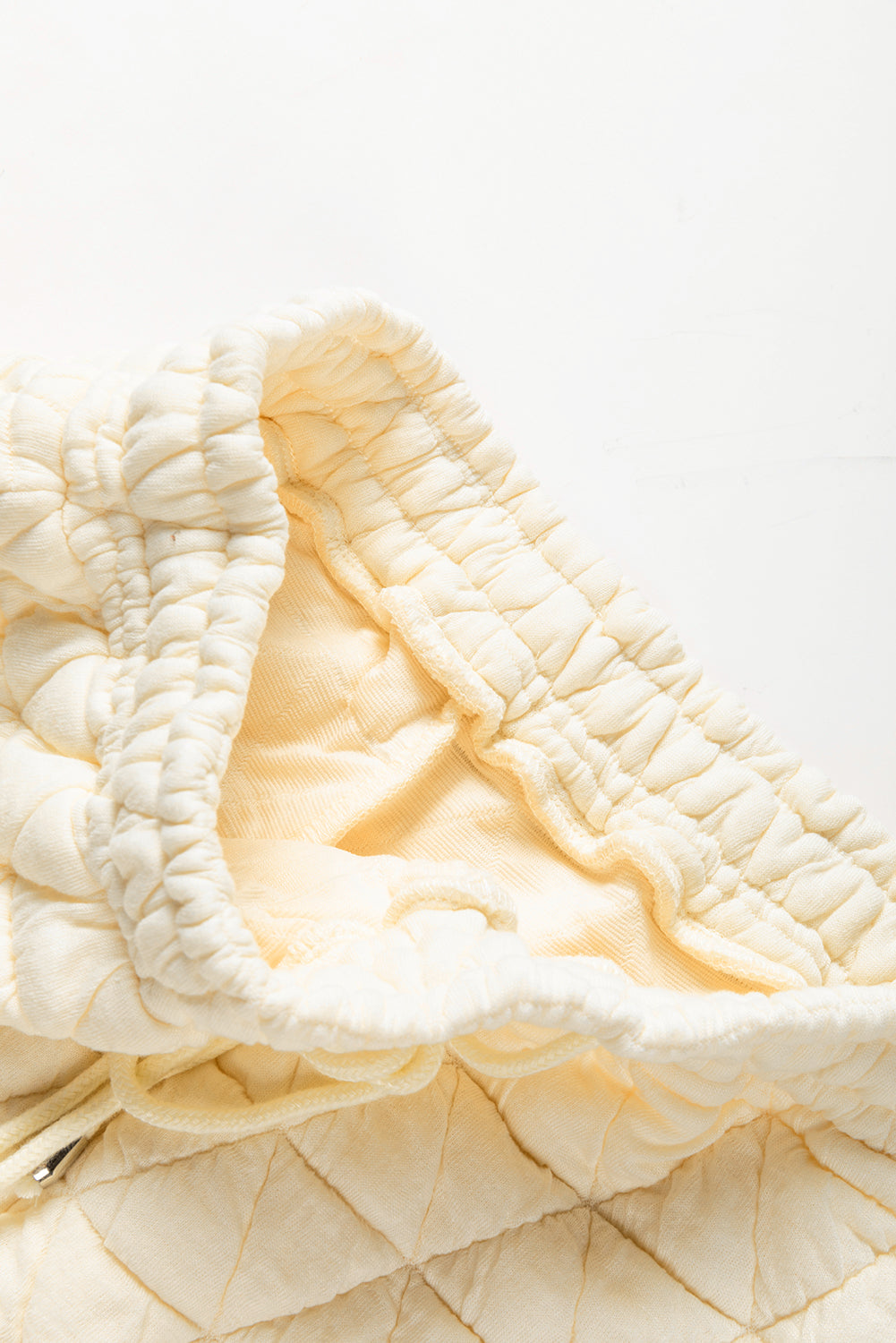 Parchment Quilted Patchwork Exposed Seam Hoodie