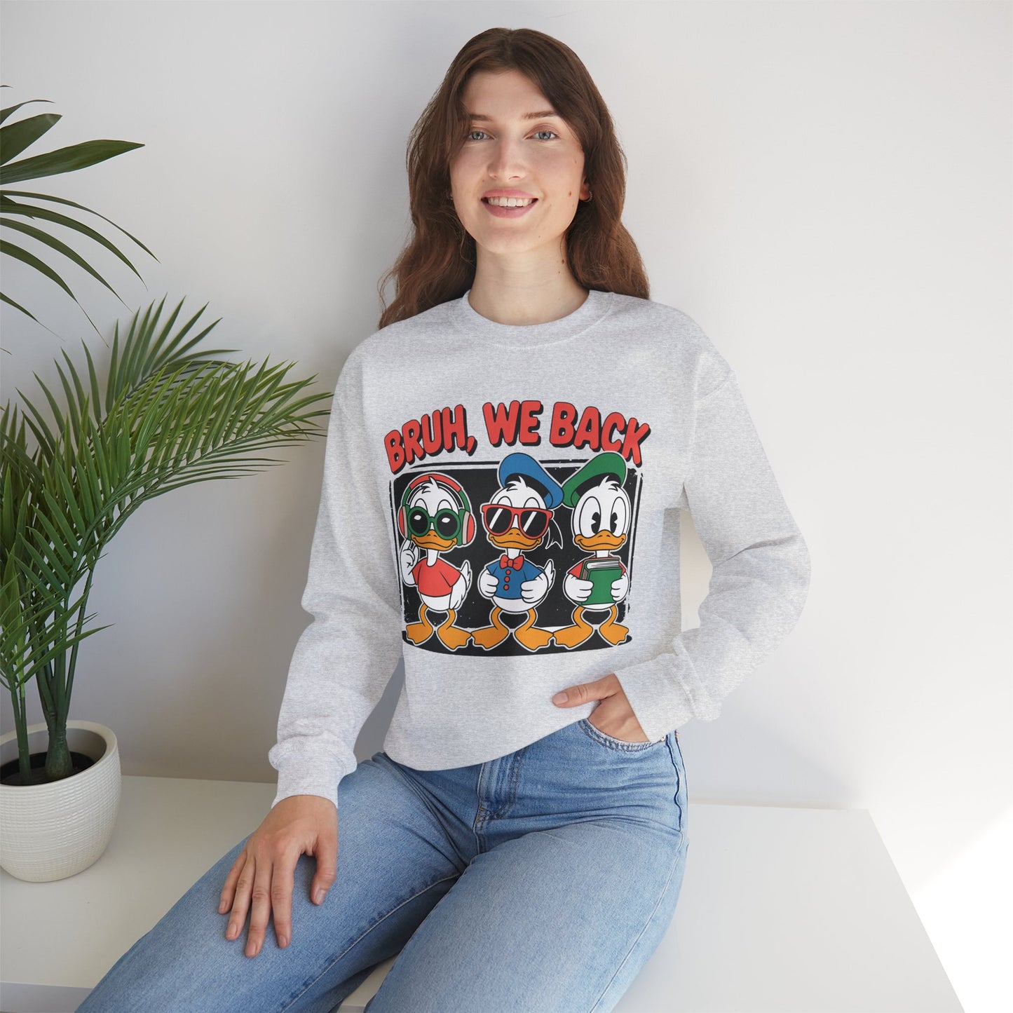 Bruh We Back Ducklings  Heavy Blend™ Crewneck Sweatshirt